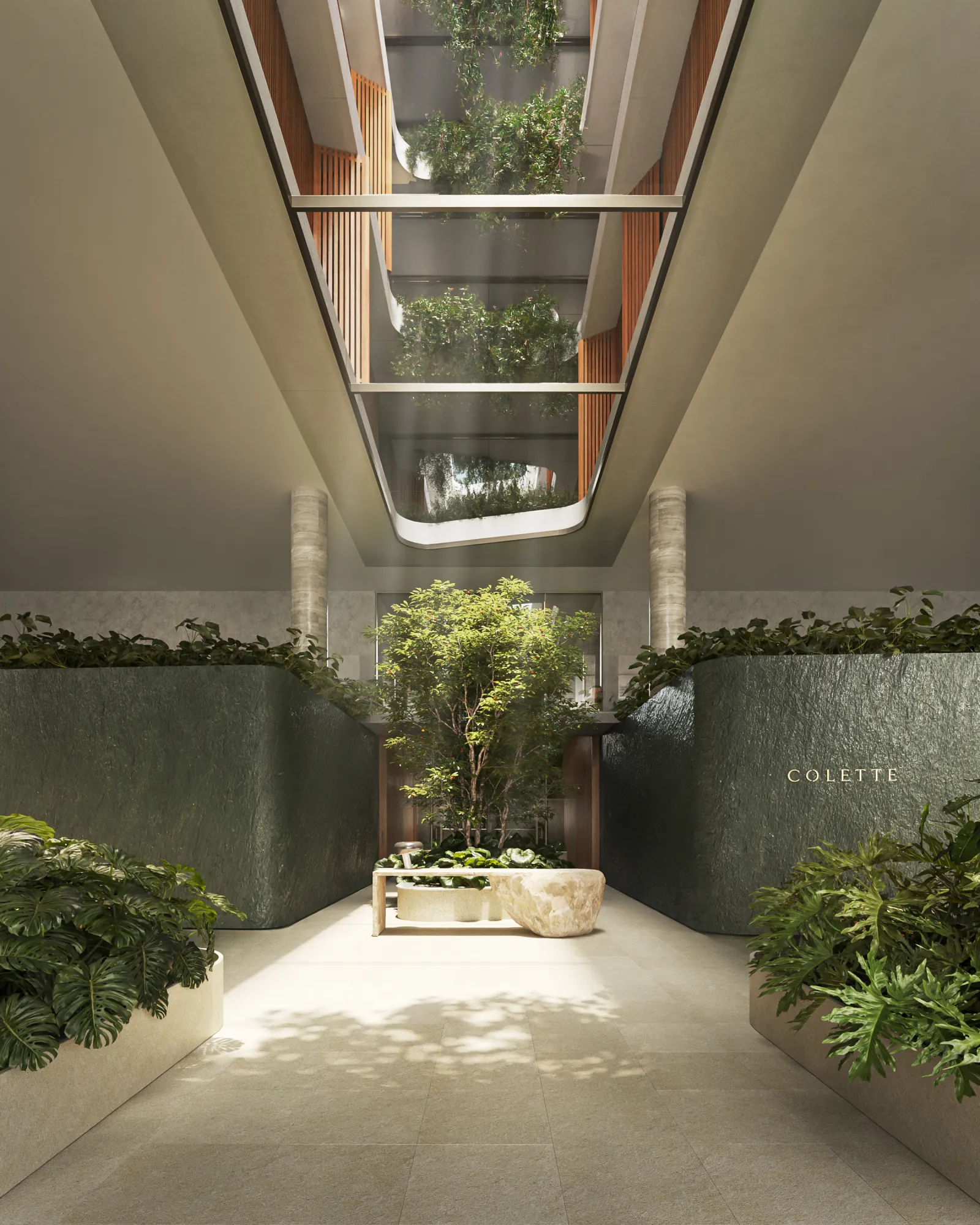 Colette’s planted concierge lobby beneath a light well
